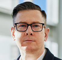 Photo d'Alexander Hughes, PDG d'une entreprise de trading crypto